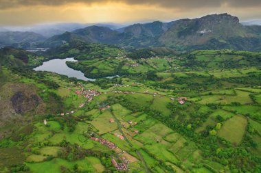 Aerial view of Penerudes village and Alfilorios reservoir, Morcin municipality, Asturias, Spain