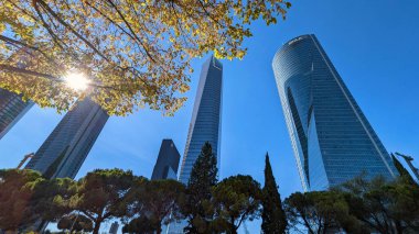 Madrid, Spain; 4th october 2025: Cuatro Torres Business Area, financial district skyline next to green areas