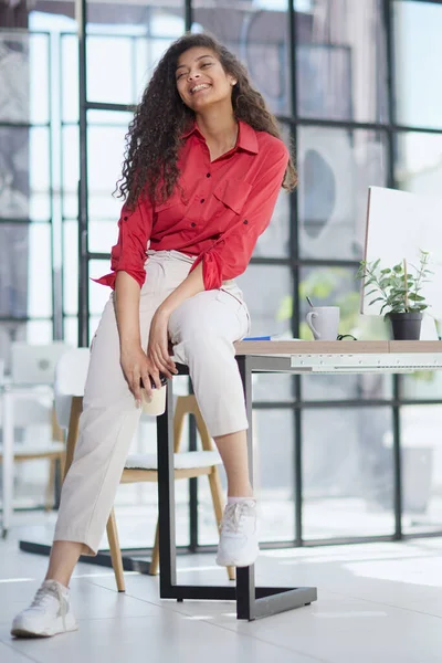 Attractive young businesswoman with a happy smile