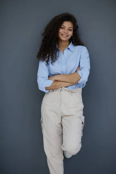 stock image Photo of cheerful self-assured lady folded arms wear blue shirt grey color background