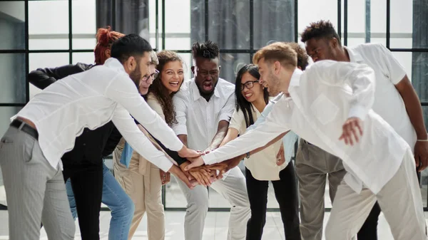 Teamwork and team spirit ,handshake in a group after work succe