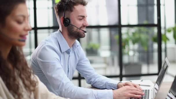 Guy Technical Customer Service Support Answering Voice Calls Clients Office — Video