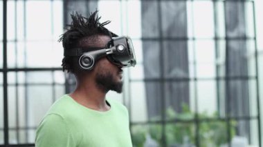 A man is looking for bright impressions using gadgets.