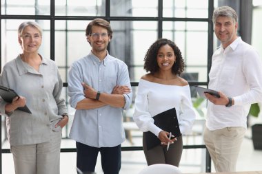 A group of young modern people in smart casual clothes
