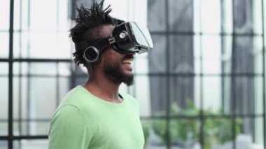 A man is looking for bright impressions using gadgets.