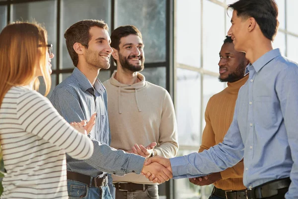 stock image friendly hr manager or team leader greeting or welcoming new worker