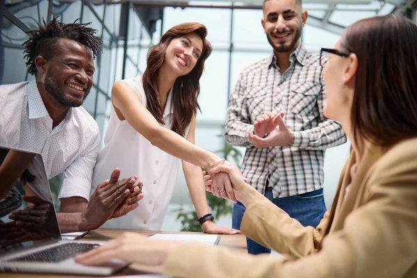 stock image Manager shaking the hand of a female applicant