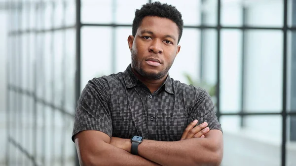 stock image Portrait of a serious young professional businessman wearing looking at camera