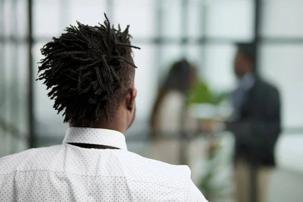 Stock image Portrait of a middle-aged african man standing with his back