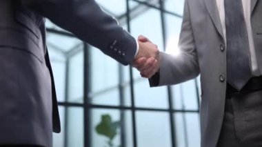 İş adamlarının el sıkışması, iş ahlakı, tebrik, birleşme ve satın alma kavramları