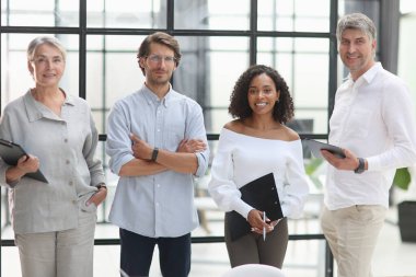 A group of young modern people in smart casual clothes