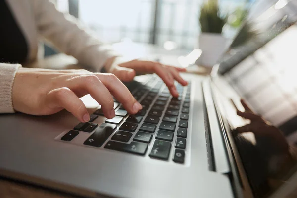 stock image Businessman working at a home office uses a close-up keyboard,