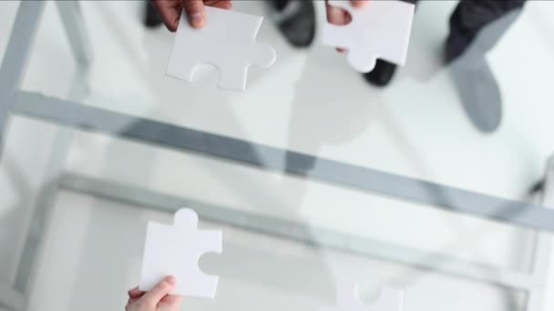 Praca Zespołowa Białym Puzzle Cztery Elementy Koncepcji Jedności Współpracy Widok — Wideo stockowe