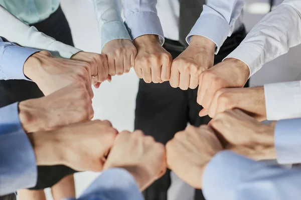 Closeup View Businesspeople Standing Circle Fists Bumping Showing Unity — Stock Photo, Image