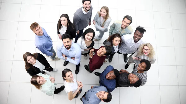 stock image multicultural successful business group looking up in office corridor