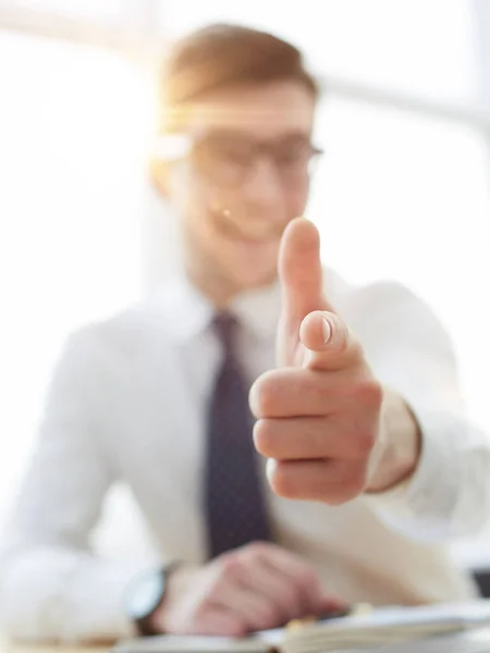 businessman pointing his finger to you at office