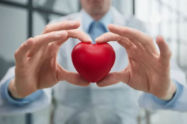 Doctor Holding Heart His Hands Close — Stock Photo, Image
