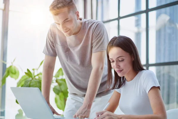 stock image male ceo executive manager mentor giving consultation on financial operations to female colleague intern using laptop sitting in modern office