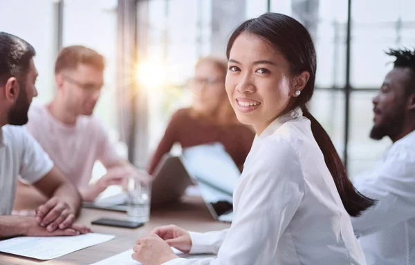 stock image Silhouettes of people sitting at the table.