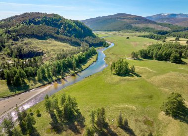 aerial view of the course of Clunie River near Braemar in the Cairn Gorms national Park, Scotland, UK