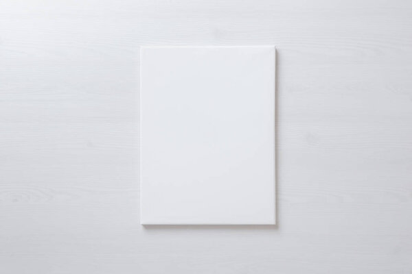 Vertical blank art canvas frame mockup for arts painting and photo presentation mockup. Laid on the floor