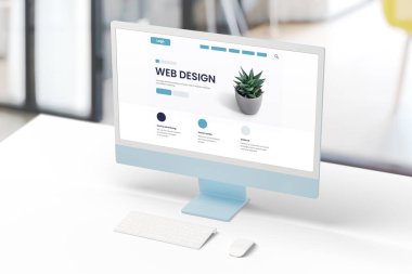 Web tasarım stüdyosu konsept sayfası olan bir ofis masasında modern bilgisayar görüntüsü. Web tasarım şirketi sunumu