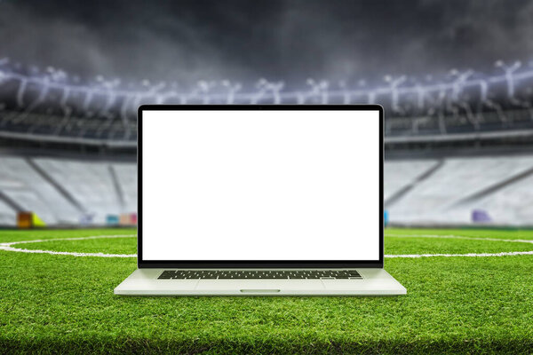 Laptop mockup on football field. Stadium stands in background. Isolated screen for app or web page promotion