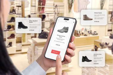 Ayakkabıcıda moda ayakkabılar. Akıllı telefondan şimdi satın alma düğmesi olan internet uygulaması. Yüzen balonlar ayakkabı önerilerini öneriyor