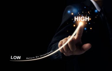 Businessman hand drawing for increasing arrow from LOW to HIGH for Financial and business investment concept.