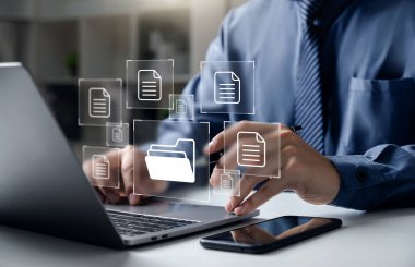 Document Management System DMS, Businessman pointing to folder and document, system used to create, store, manage, and track electronic document.