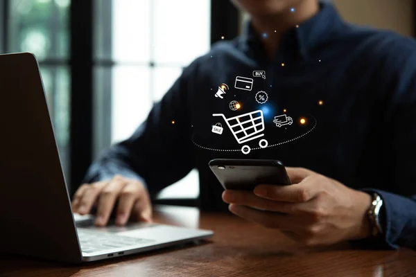 Young Man Using Smartphone Shopping Cart Icon Online Shopping Commerce — Stock Photo, Image
