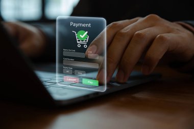 Online payment concept, Young man using laptop with banking applications via internet network.