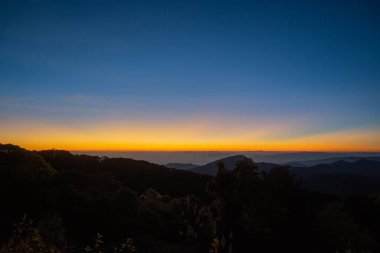  beautiful silhouette view of mountain at sunrise (Doi Inthanon National Park, Chiang Mai), soft focus and low key