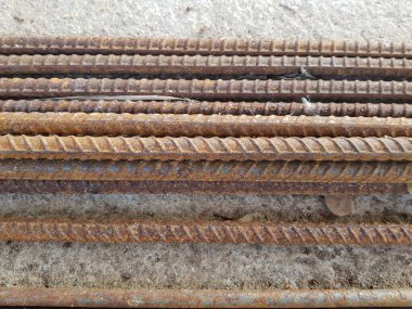 old iron and rusty iron.  Rusty steel  line on concrete background.