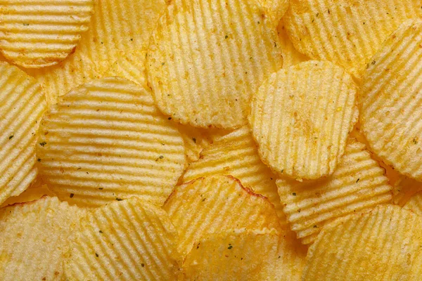 Lots of potato chips, texture close up