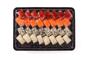Sushi set in a delivery box on a white background close-up