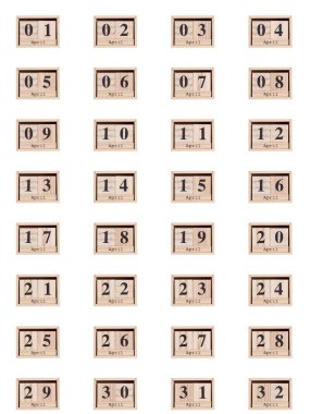 Ahşap takvim, tarih dizisi Nisan 01-32, beyaz arka plan yakın plan