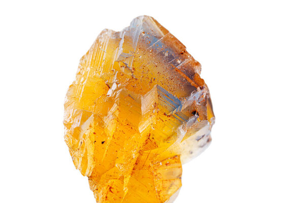Macro mineral stone Fluorite yellow and blue color on a white background close-up