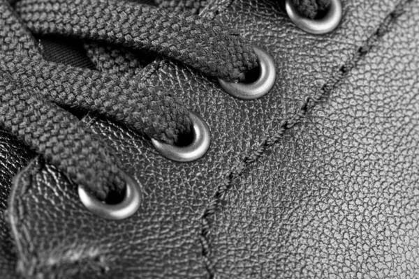 black leather texture with stitching close up