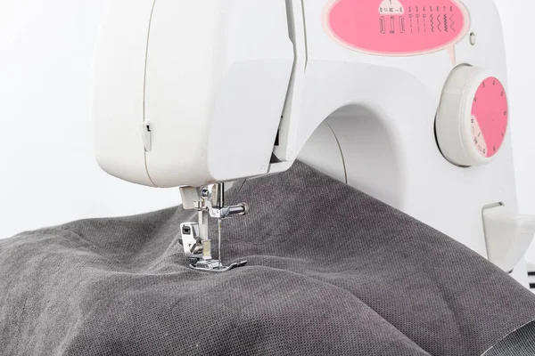 stock image Sewing machine, stitching fabrics, needle in a round plan close up