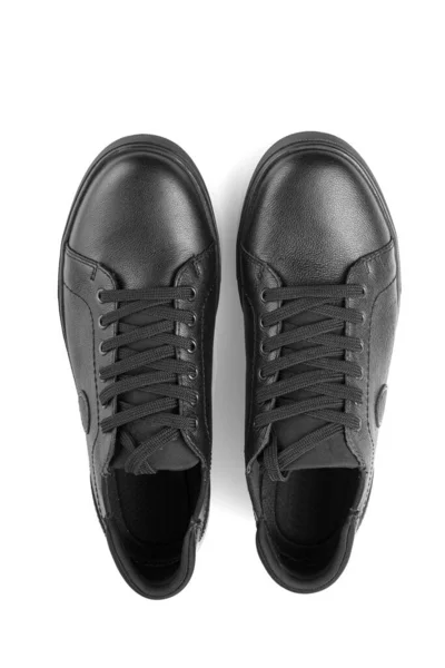 Zwart Lederen Sneakers Een Witte Achtergrond Close — Stockfoto