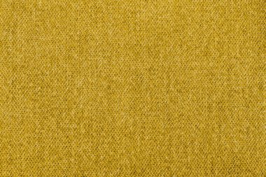 Sarı renk kot kumaş, beyaz arkaplanda fabrika kumaşı.