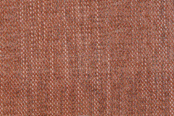 Factory fabric in orange color, fabric texture sample for furniture close up