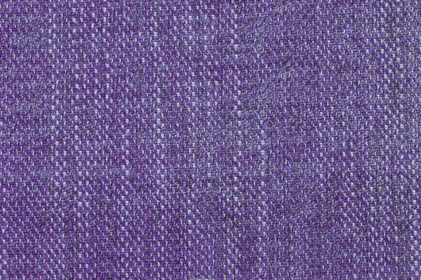 Factory fabric in purple color, fabric texture sample for furniture close up