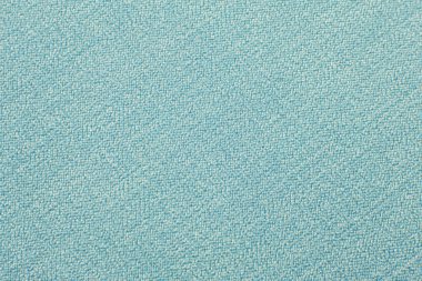 Dikiş için kumaş kumaşları ve mobilya mavisi yakın plan.