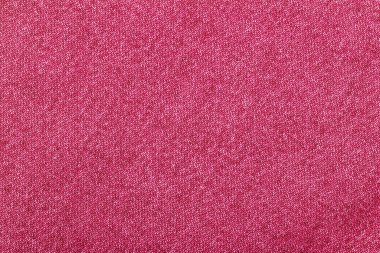 Pembe renk kot kumaş, beyaz arkaplanda fabrika kumaşı yakın plan.
