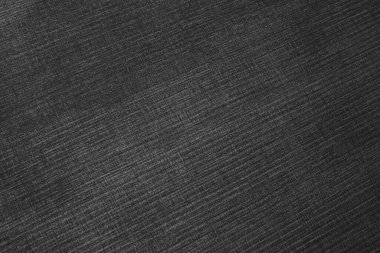 Dokulu kadife mobilya kumaşı turuncu siyah yakın plan.