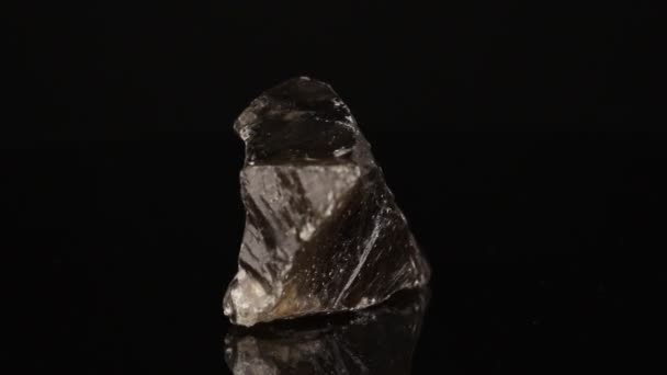 Polished Mineral Stone Smoky Quartz Rotates Circle Black Background Close — 图库视频影像