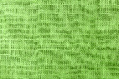 texture fabric burlap for sewing green background color macro close-up