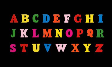 İngiliz alfabesinin ahşap harfleri. Siyah arka planda çok renkli.